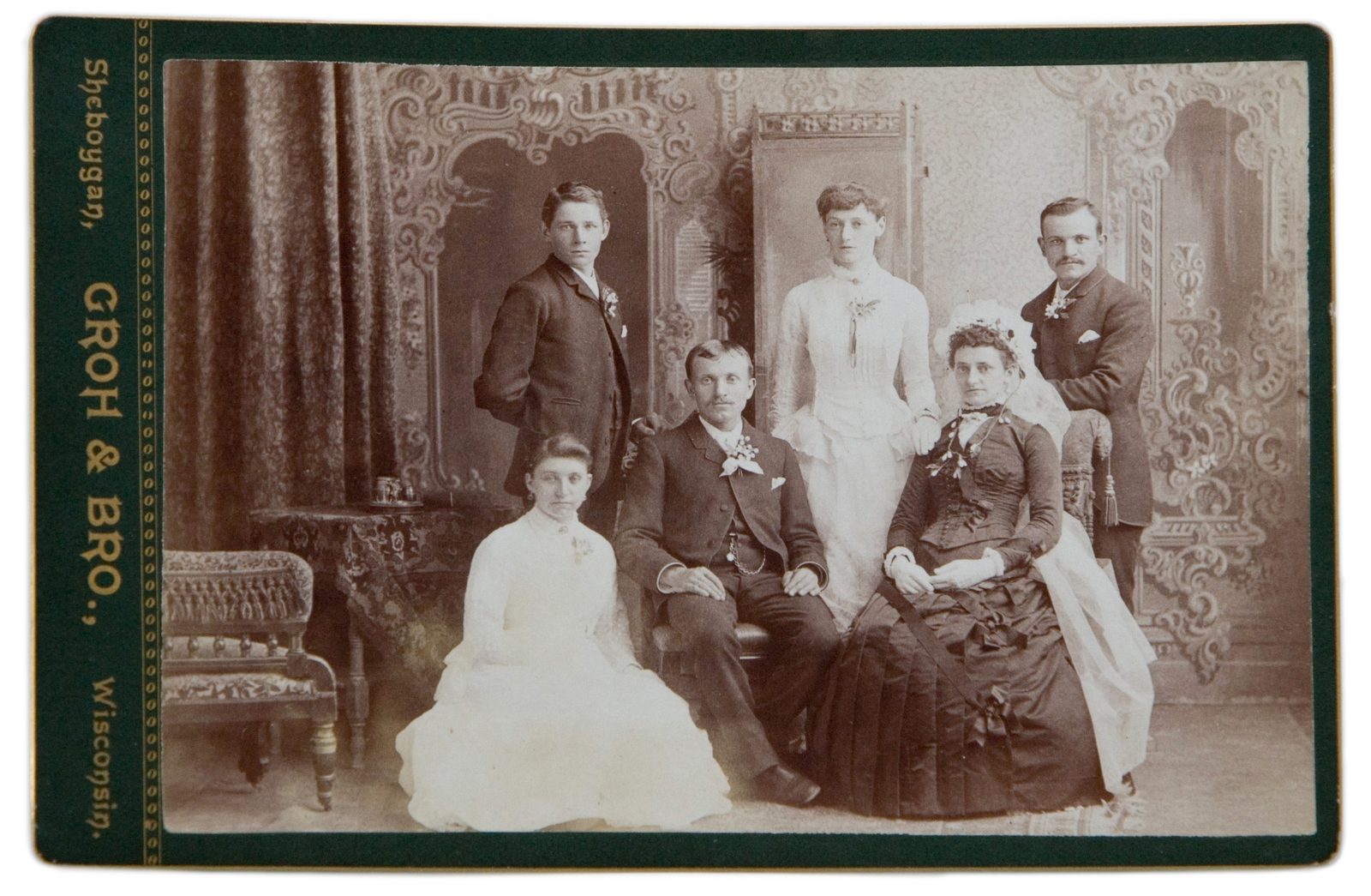 Cabinet card of a wedding party, 1870s or 1880s.